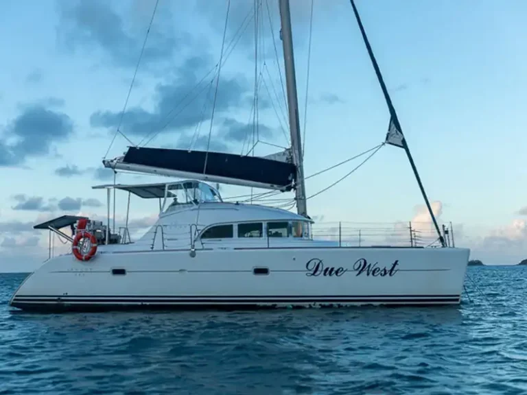 SV Due West sailing catamaran anchored in the Whitsundays