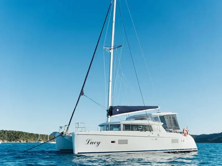 SV Lucy sailing catamaran anchored in the Whitsundays