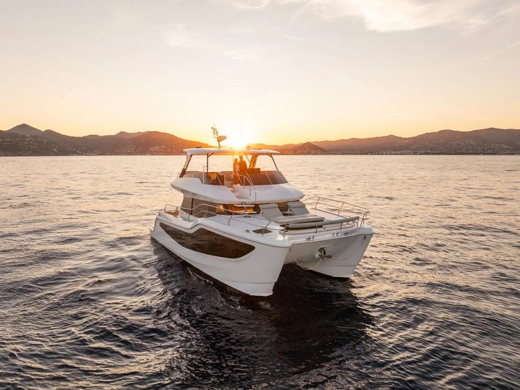 Ānanda Aquila 46 power catamaran at anchor